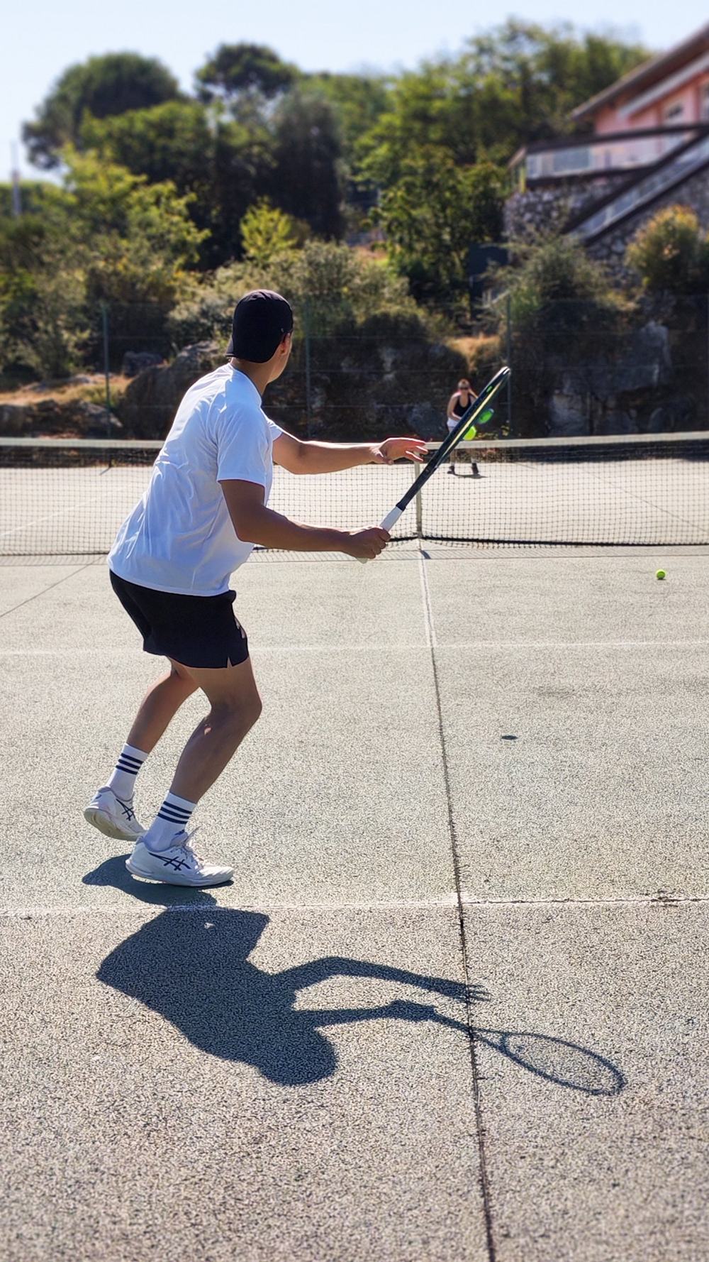 Leçon de tennis sur un court privé